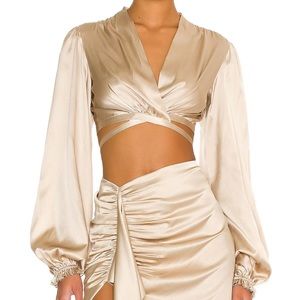 Revolve Iiria Top in Gold
Silk Roads by Adriana Iglesias